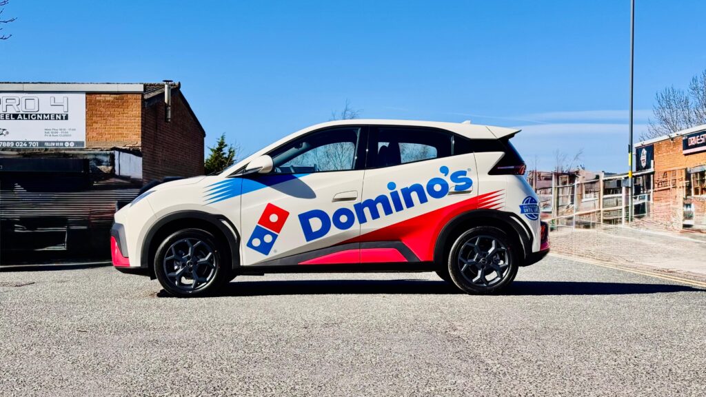 Dominoes branded BYD electric vehicle
