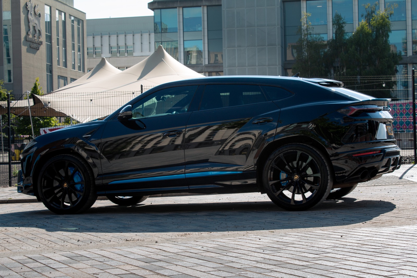 Lamborghini Urus Metallic Black Wrap with Blue Accents and Caliper Painting in Birmingham 1