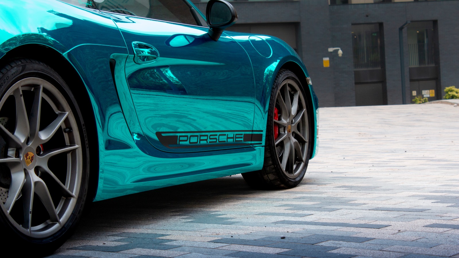 Porsche Cayman Light Blue Super Chrome Wrap in Birmingham 1