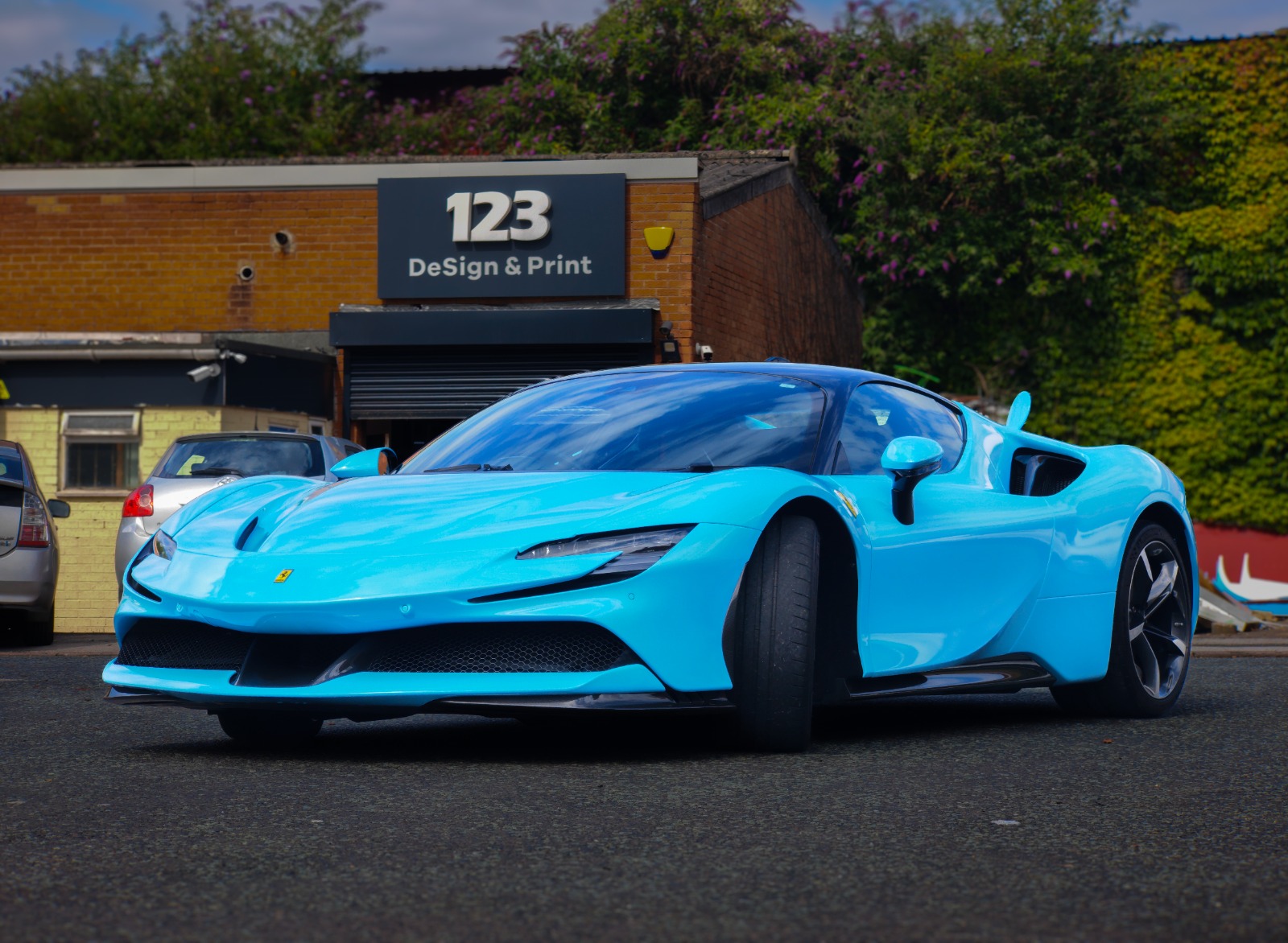 Ferrari SF90 wrapped in Gulf Blue - front three quarter view